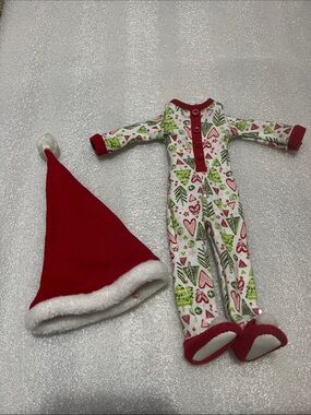 American Girl doll outfit is the Hearts and Pines Holiday PJ and red hat